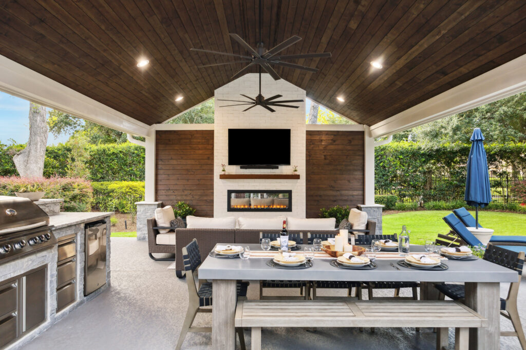 Under the patio cover - a view of the fireplace and dining table. 