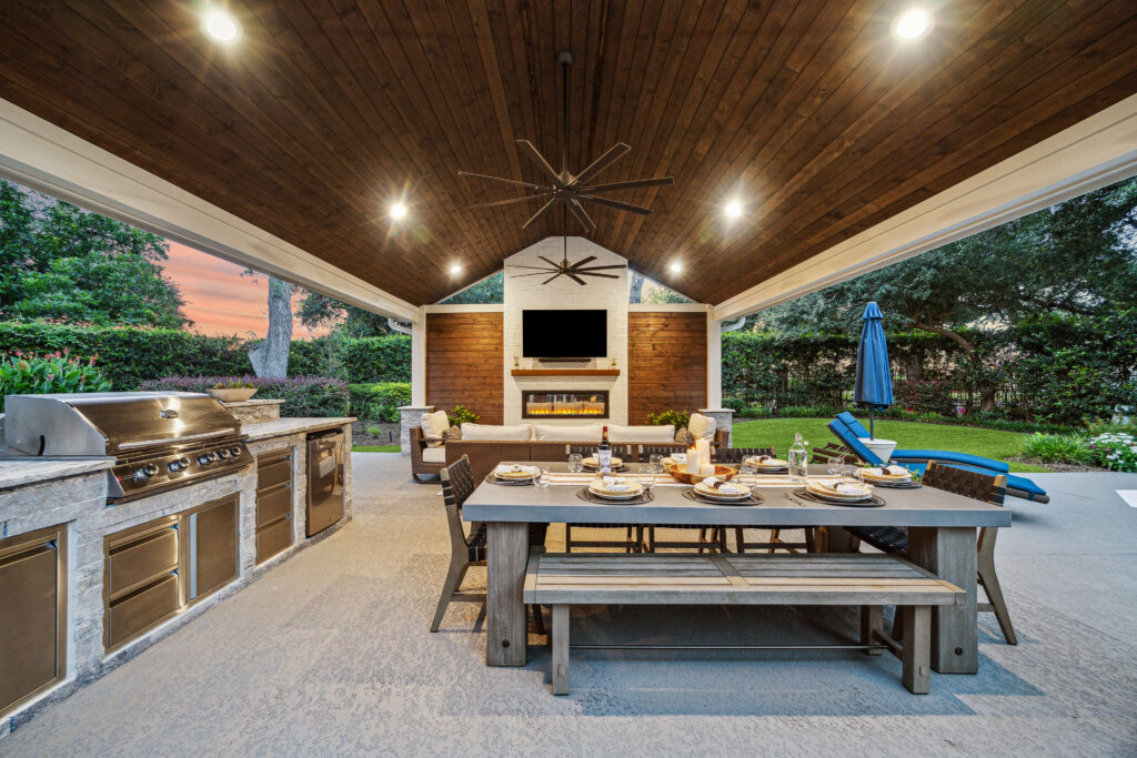 Under the patio cover - the outdoor kitchen and the fireplace wall. 