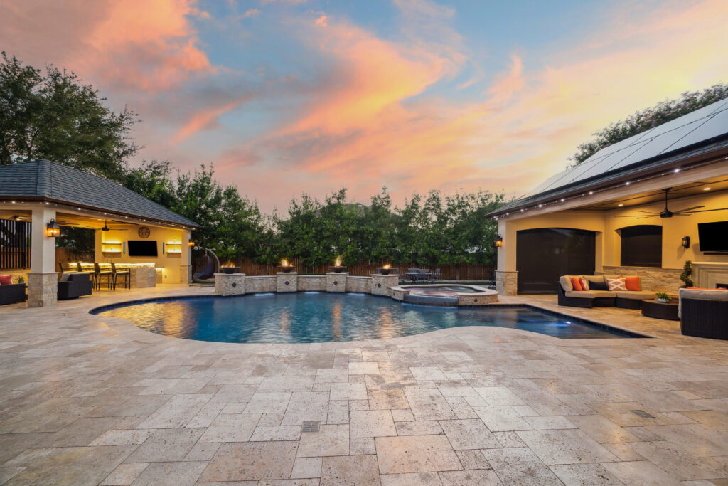 Outdoor living room showing the retractable screens and the outdoor bar
