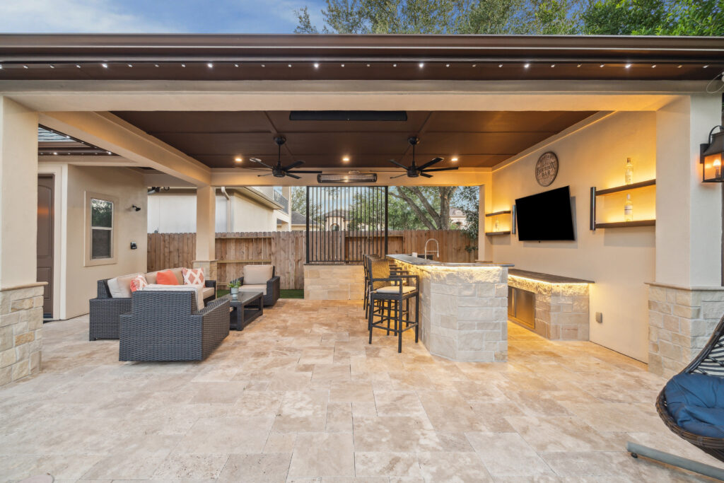 Patio cover with outdoor bar and seating area
